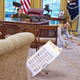 Illustration for article titled Trump Boys Leave $5 Bill, Candy Bar Under Propped-Up Laundry Basket In Effort To Catch Op-Ed Writerem/em
